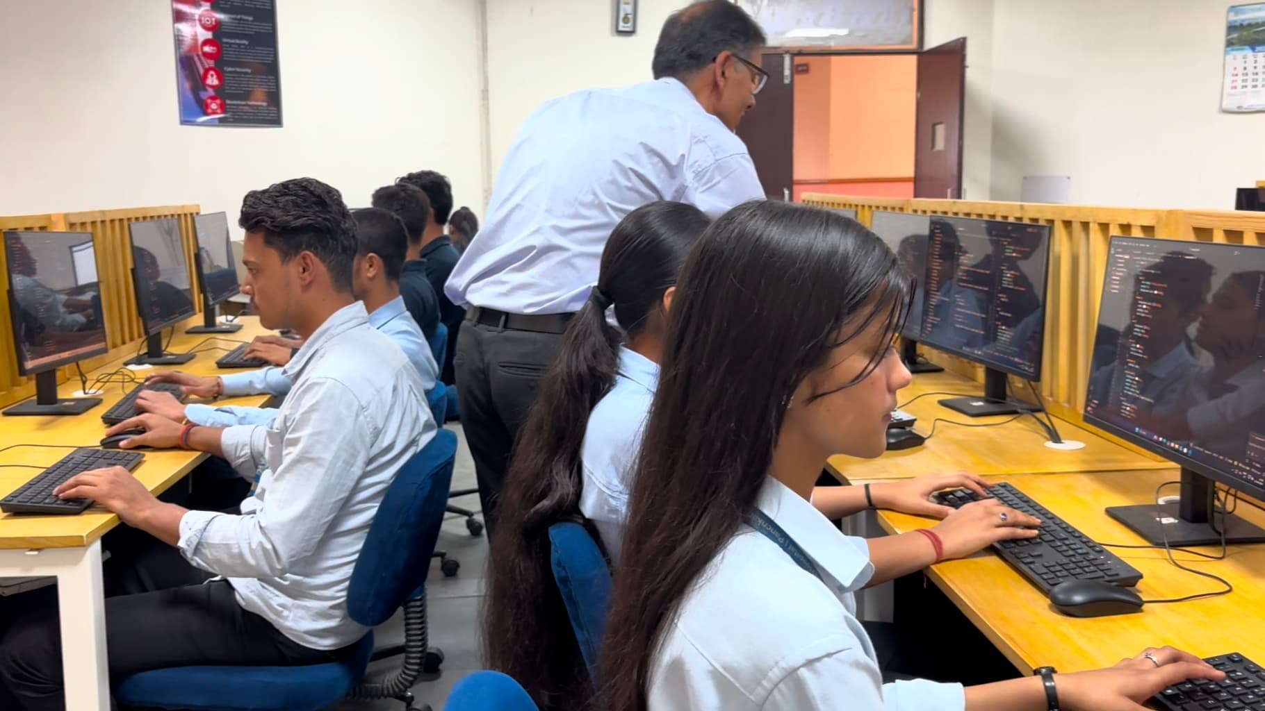 Faculty supervising lab session